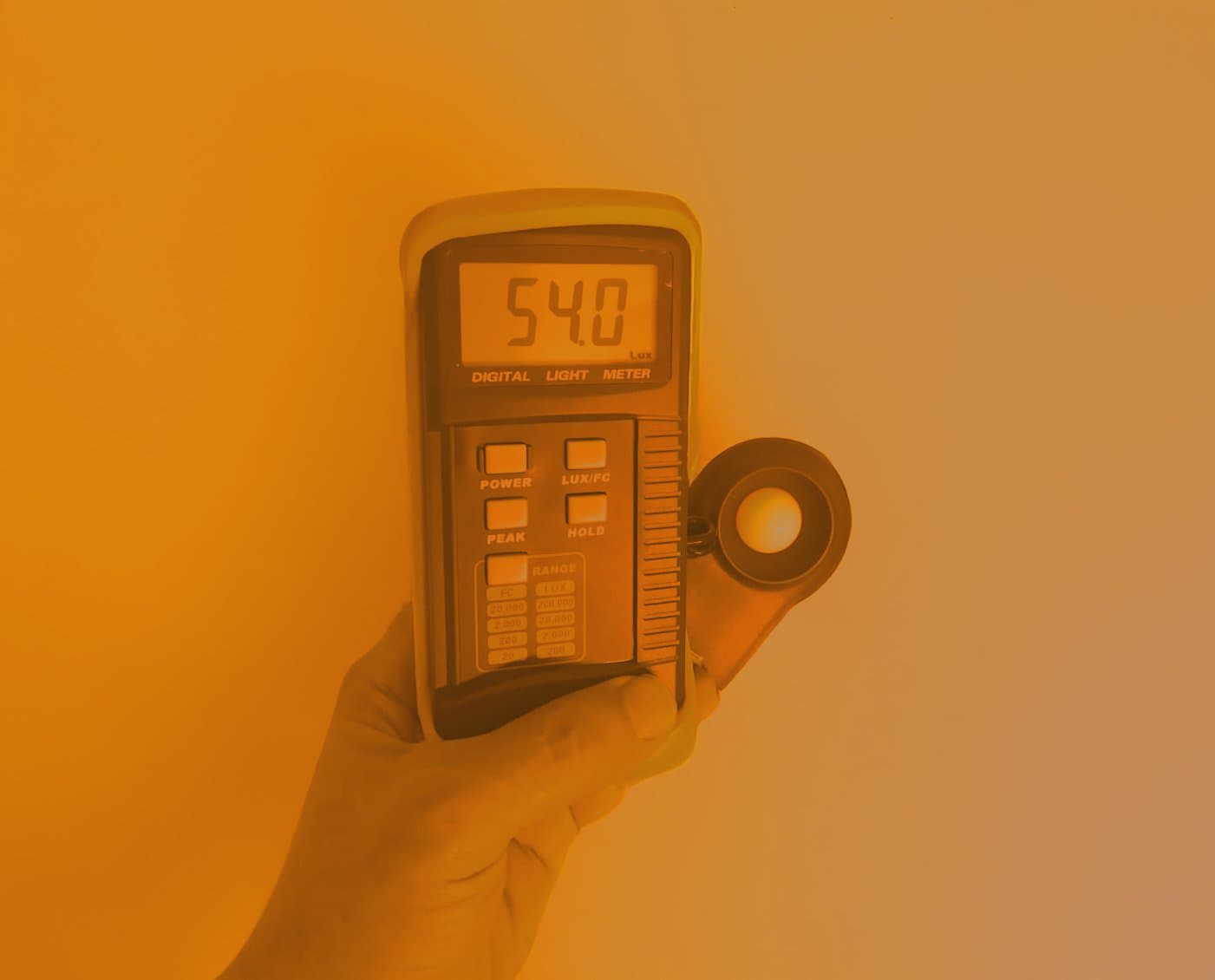 Luxmeter reading 53 lux from amber LED strip